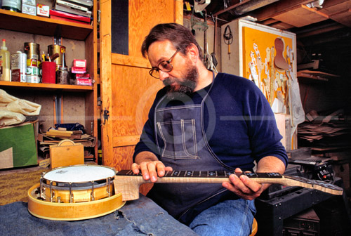 HD_P-08 - Lowell Jacobs, banjo maker in his workshop in Wilmington, Delaware assenblying an instrument. (For Frets Magazine article, August, 1998) HD_P-08 - Lowell Jacobs, banjo maker in his workshop in Wilmington, Delaware assenblying an instrument. (For Frets Magazine article, August, 1998)