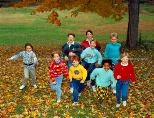 HD_P-16 - Group of kids running up hill in fall, for company display. HD_P-16 - Group of kids running up hill in fall, for company display.