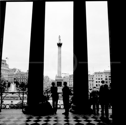 HD_P-38 - People at entrance to National Gallery in London stare out at Trafalgar Square. HD_P-38 - People at entrance to National Gallery in London stare out at Trafalgar Square.