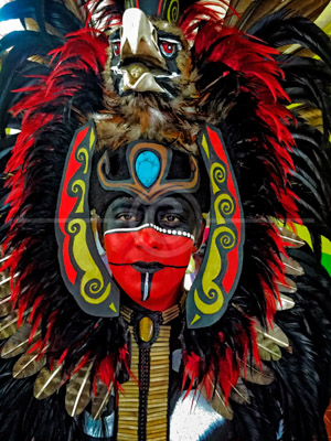 HD_P-42 - Closeup of local Cancun resident posing as a Mayan warrior in full costume at central market. HD_P-42 - Closeup of local Cancun resident posing as a Mayan warrior in full costume at central market.