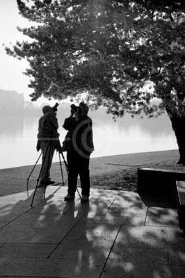 HD_P-46 - Two photographers photographing the blossoming cherry trees near FDR Memorail at the Tidal Basin in Washington, D.C.