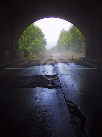 HD_STC-09 - West portal of the Sidling Hill Tunnel on abandoned PA Turnpike near Breezewood, PA. Looking out from tunnel interior, the fog coming from inside the tunnel can be seen partially obsuring the view. HD_STC-09 - West portal of the Sidling Hill Tunnel on abandoned PA Turnpike near Breezewood, PA. Looking out from tunnel interior, the fog coming from inside the tunnel can be seen partially obsuring the view.
