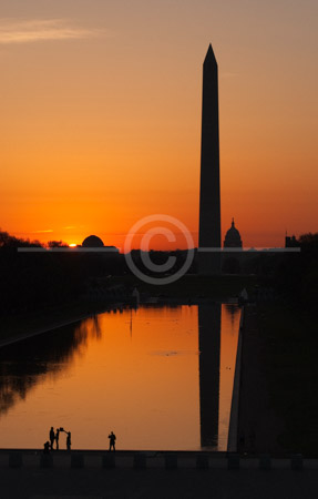 HD_STC-64 - Shot from the top of the Lincoln Memorial, a wedding photographer photographs a couple at sunrise next to the Reflecting Pool on the Mall in Washington, DC. the Washington Monument and Capitol can be seen in the background. HD_STC-64 - Shot from the top of the Lincoln Memorial, a wedding photographer photographs a couple at sunrise next to the Reflecting Pool on the Mall in Washington, DC. the Washington Monument and Capitol can be seen in the background.