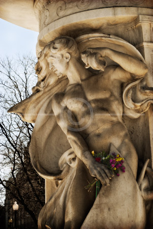 HD_STC-93 - Flowers appear to be held in hand of one of the statues on the Fountain in Dupont Circle, Washingtion, DC HD_STC-93 - Flowers appear to be held in hand of one of the statues on the Fountain in Dupont Circle, Washingtion, DC
